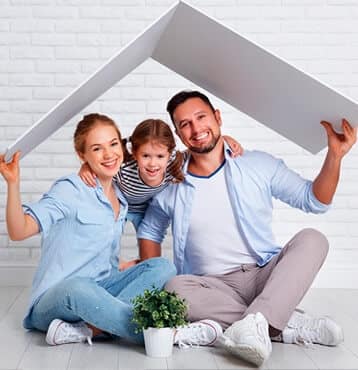 Happy Family Under Cardboard Roof